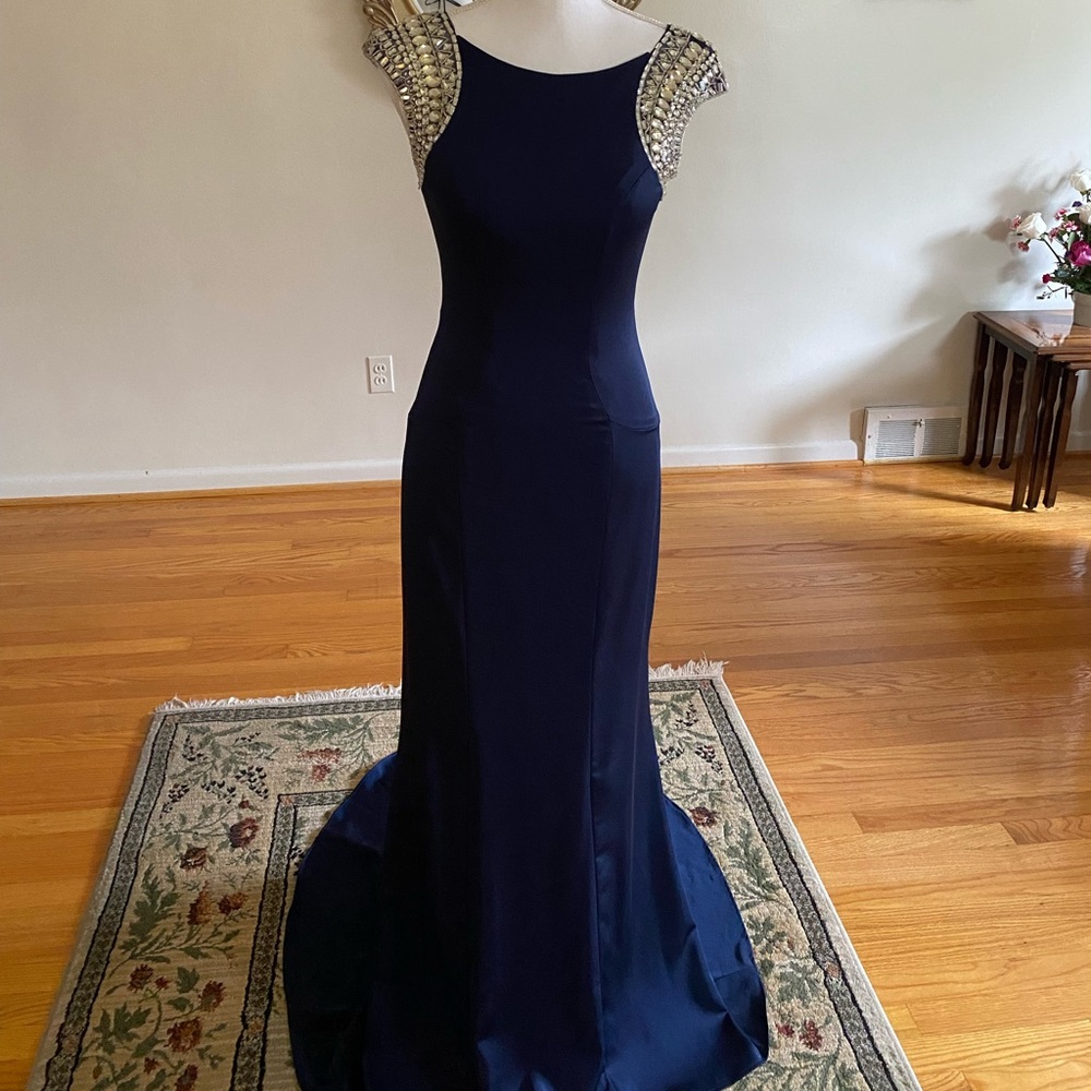 Navy long length dress with silver jewels.